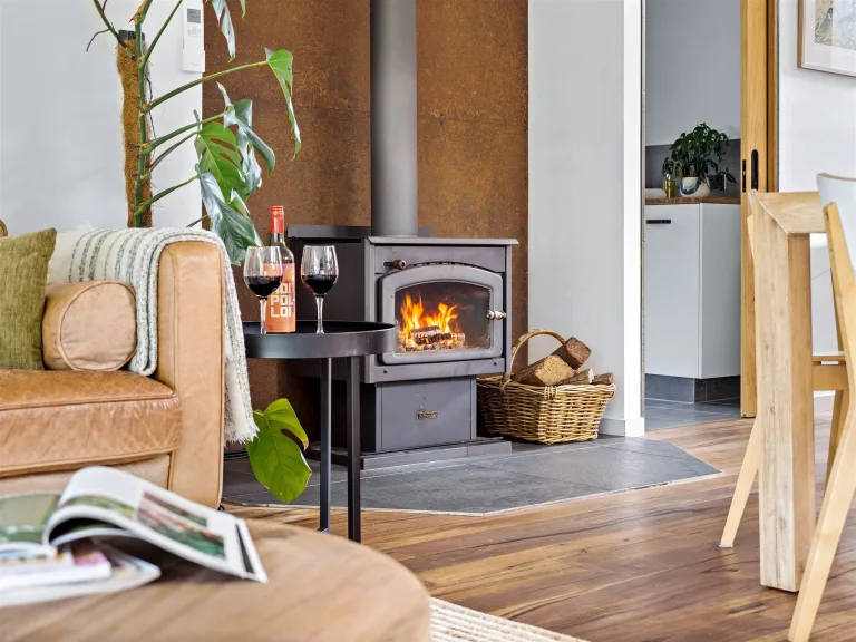 Living room area with a fireplace.